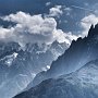 The Fohn wind whips clouds over the Grandes Jorasses