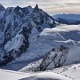 The Grandes Jorasses and the view south, into Italy
