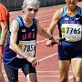 The Mighty Mouse takes off! My friend Mary Harada starts her lap in the 4x400m relay, with the USA on the way to a new World W80 record.