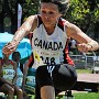 Also in full flight, Canada's Christa Bortignon, in the W75 long jump.