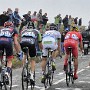 Leaders and fans on the Col de Roucy.