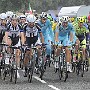 The peloton, line abreast up the Col de Roucy.